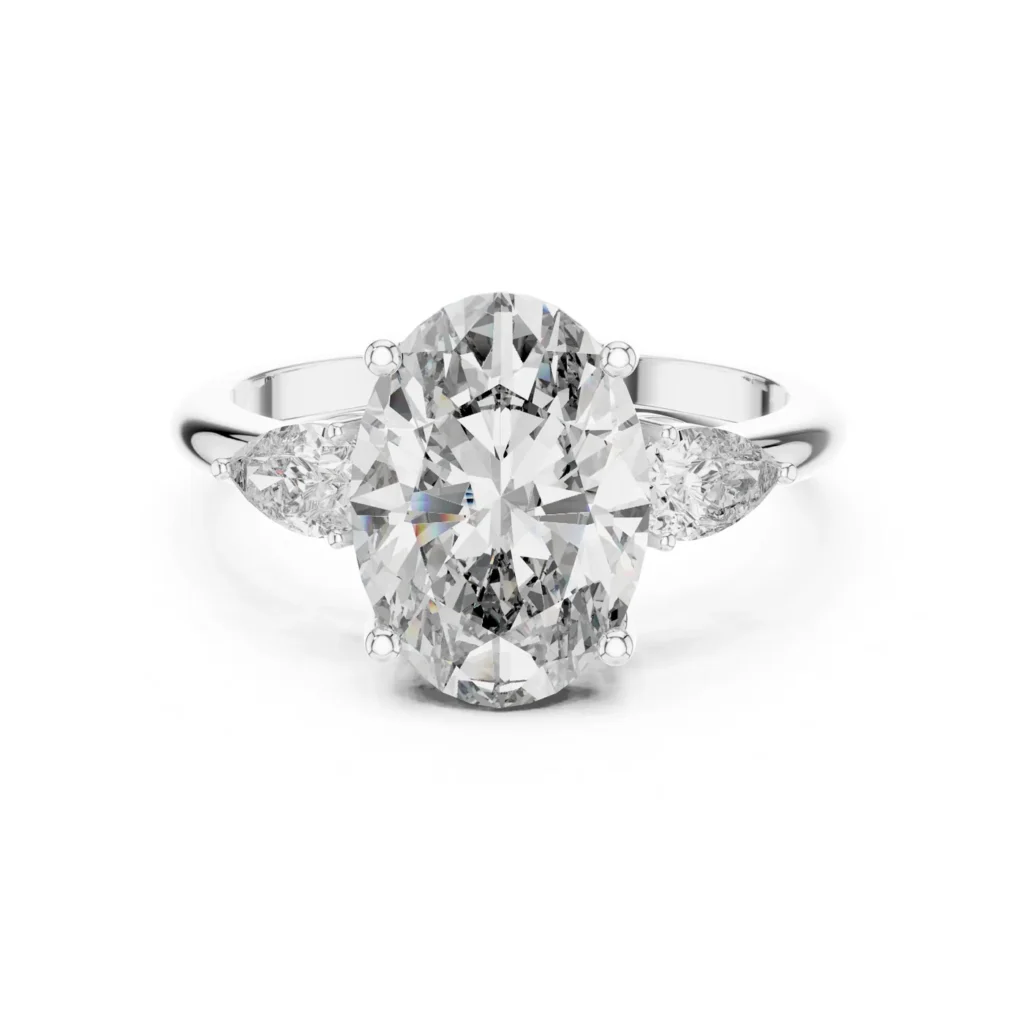 Oval and Pear Three-Stone Ring — photo 8